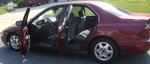002 EXTERIOR - driver side doors open.jpg
