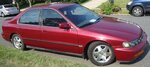 009 EXTERIOR - passenger side entire car.jpg